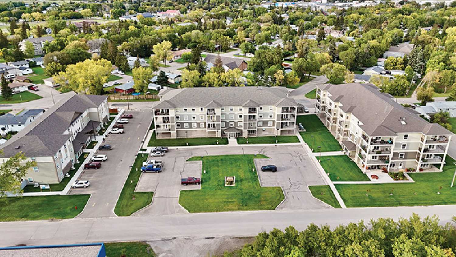 Cobblestone House, at left, and the two Pipestone Villas buildings in centre and at right.